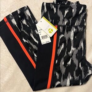 Trina Turk Dynamic Black and Gray Leggings with Vibrant Orange
